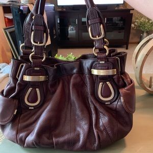 B.Makowsky used burgundy leather purse